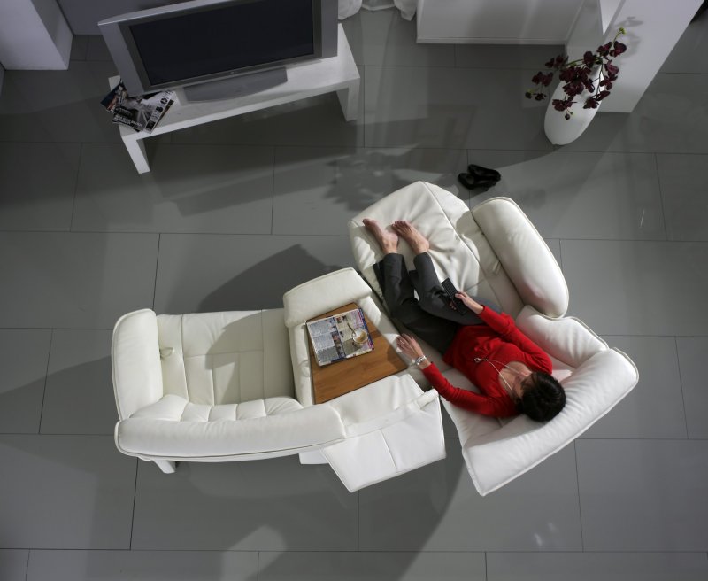 Relaxing on the Himolla Cumuly Rhine Curved Sofa
